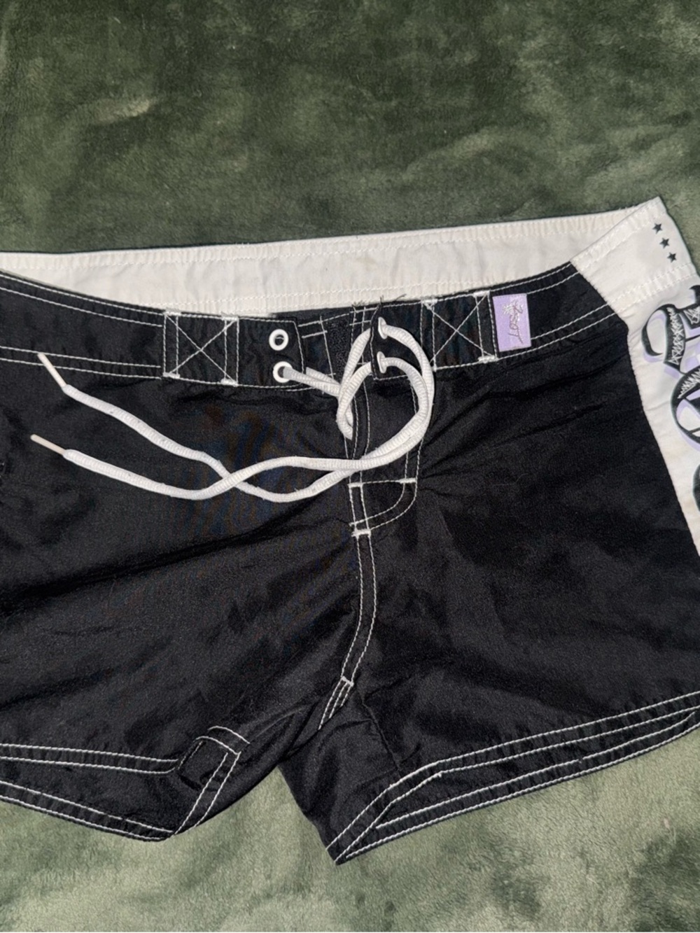 Black and White Board Shorts with Graphic Hem